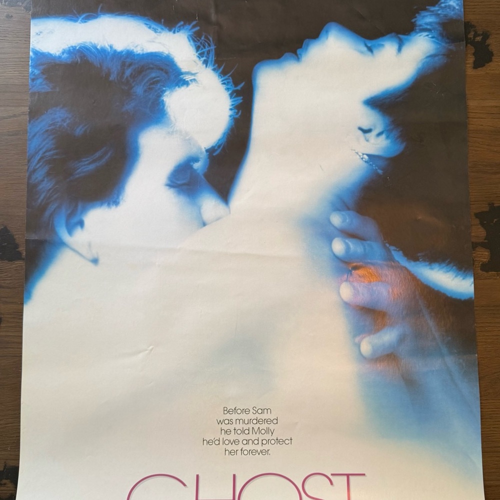 Ghost Movie Poster with Blue and White Tones